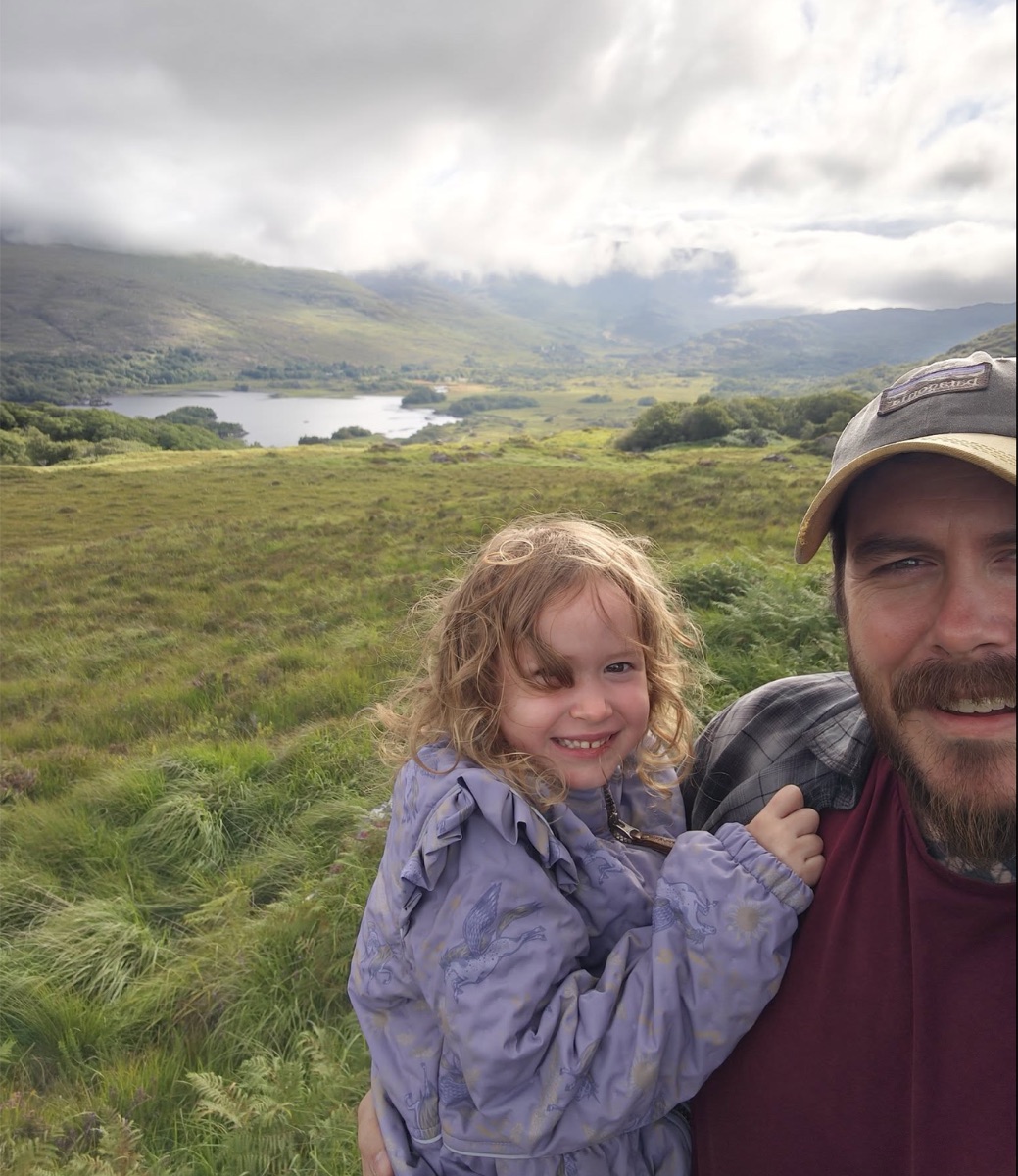 Matt O’Brien outdoors with his daughter on a family trip